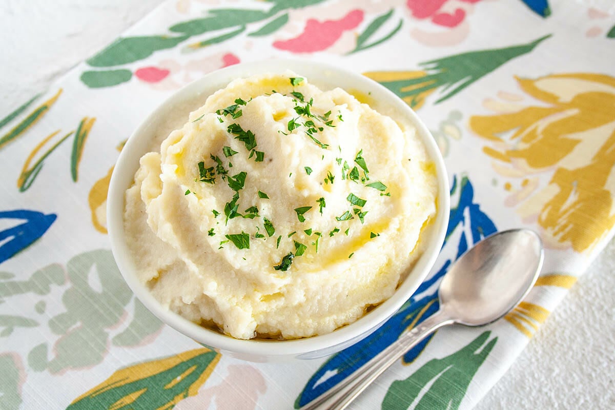 Mashed Cauliflower with spoon.