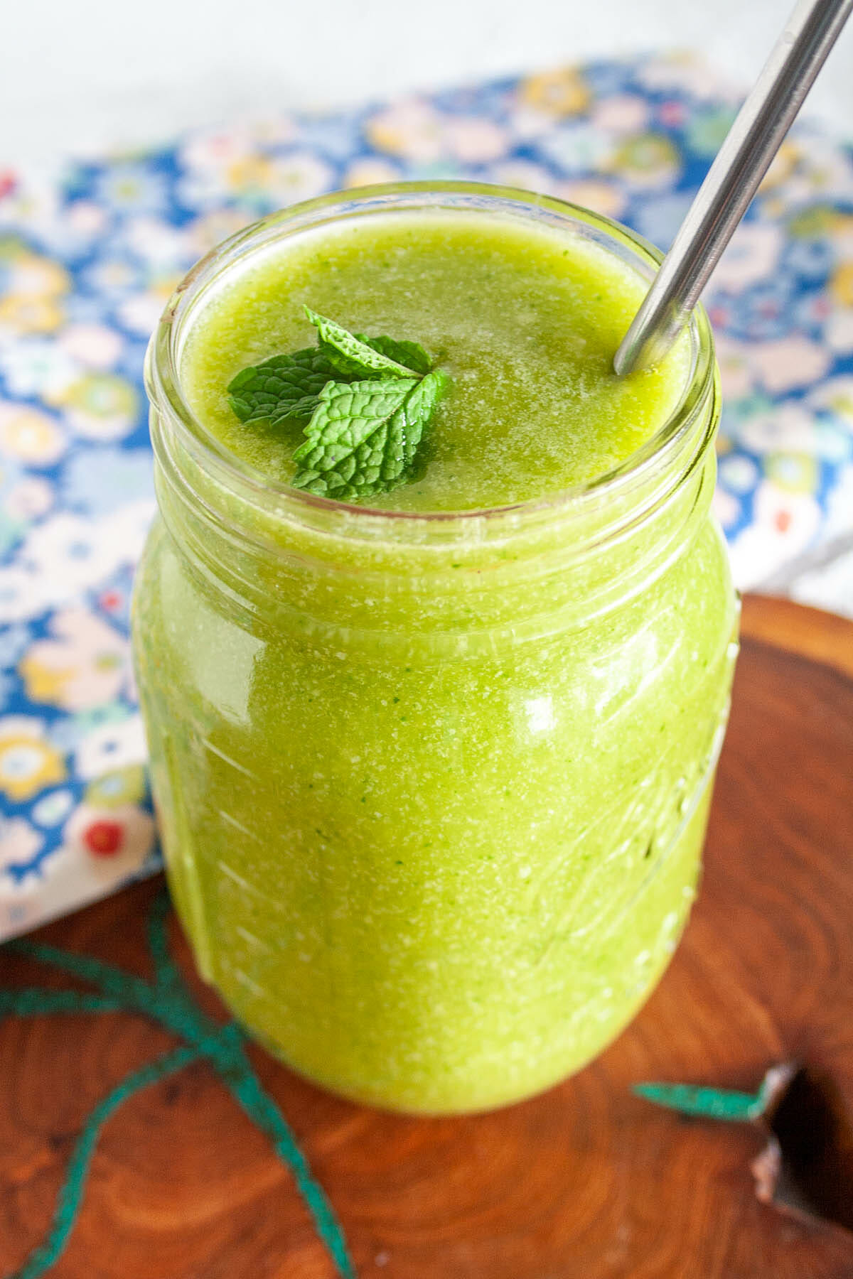 Coconut Mango Cucumber Smoothie in mason jar.