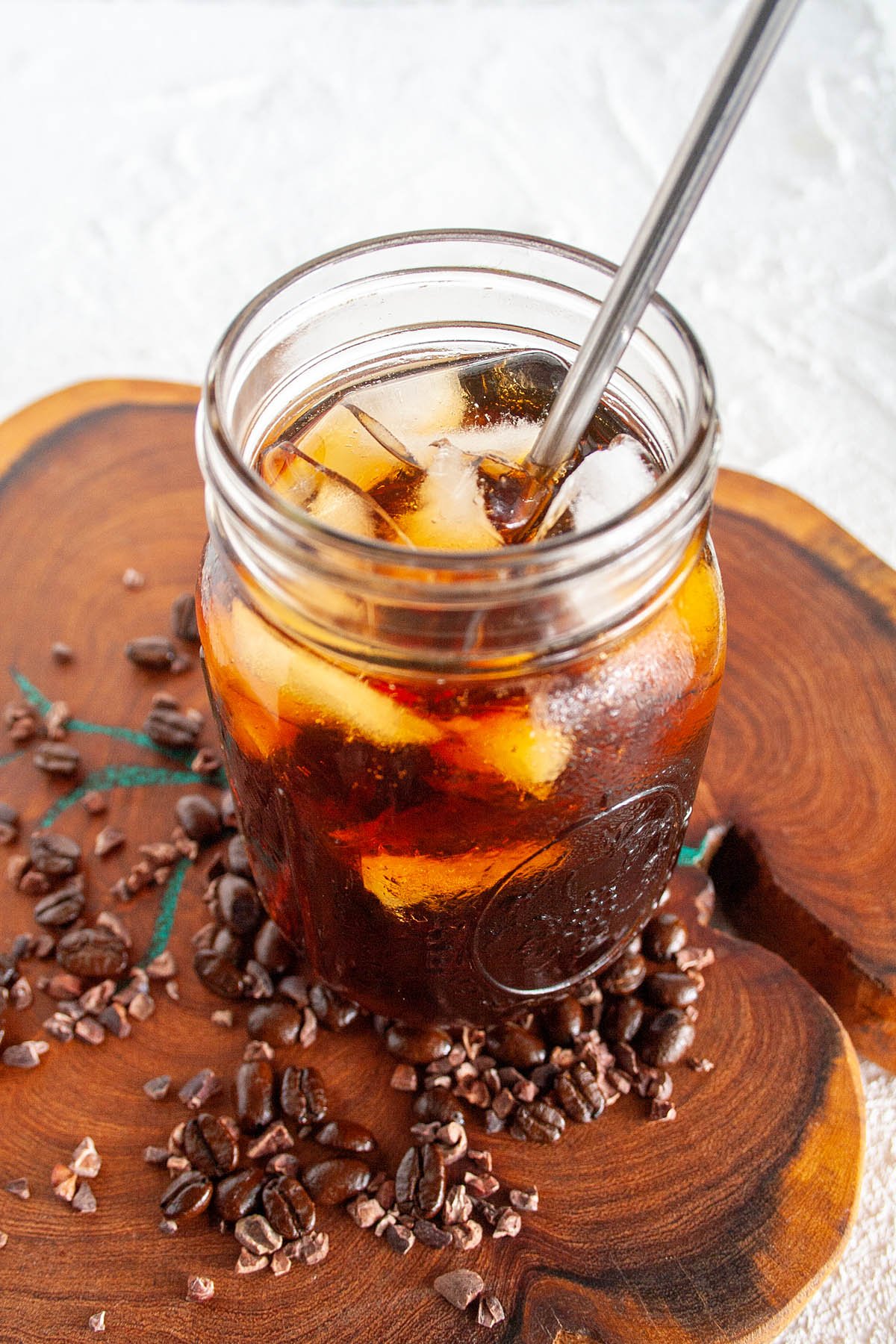 Cold Brew Cacao Coffee with straw.