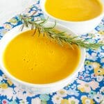 Creamy Sweet Potato Rosemary Soup in two bowls.
