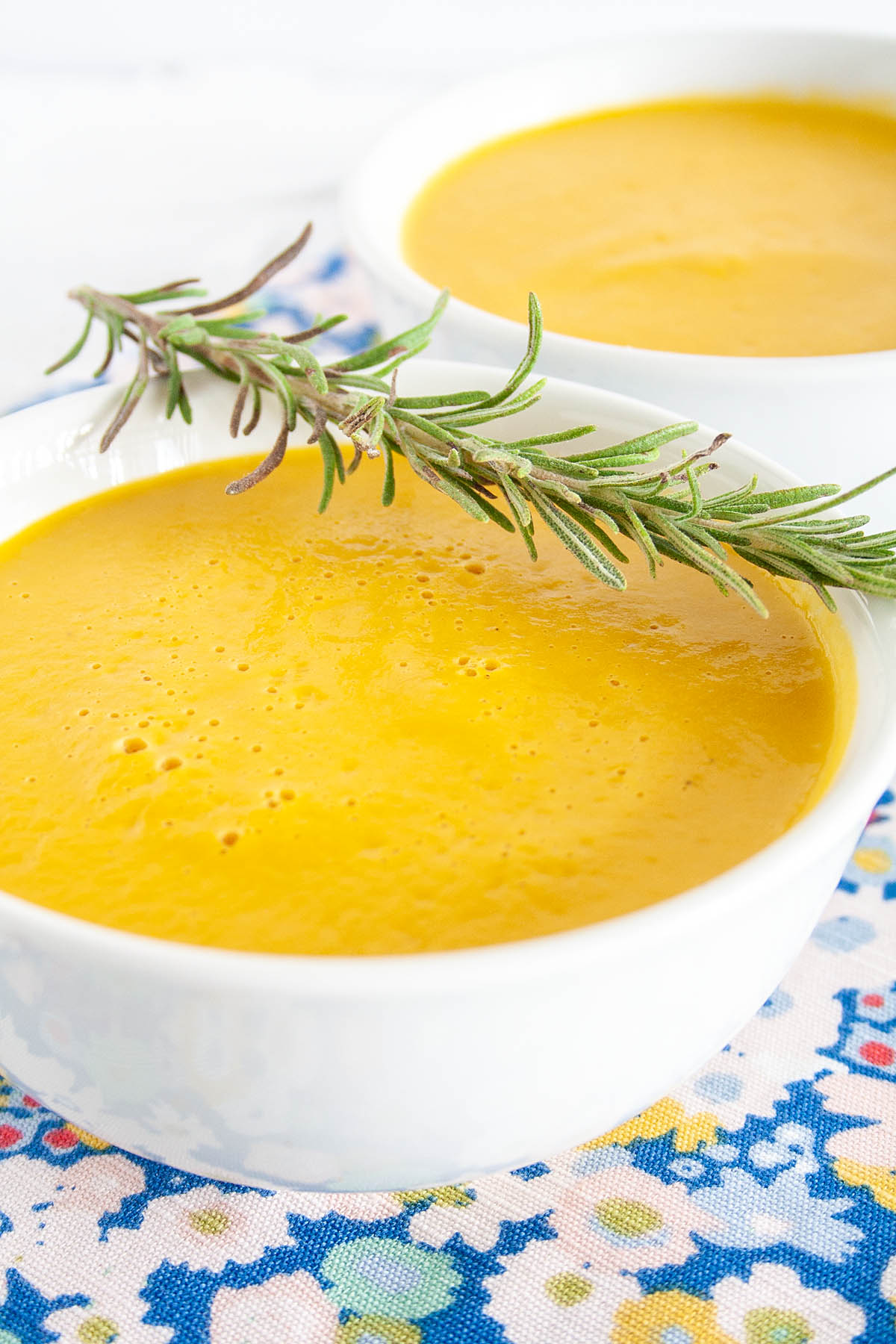 Creamy Sweet Potato Rosemary Soup close up.