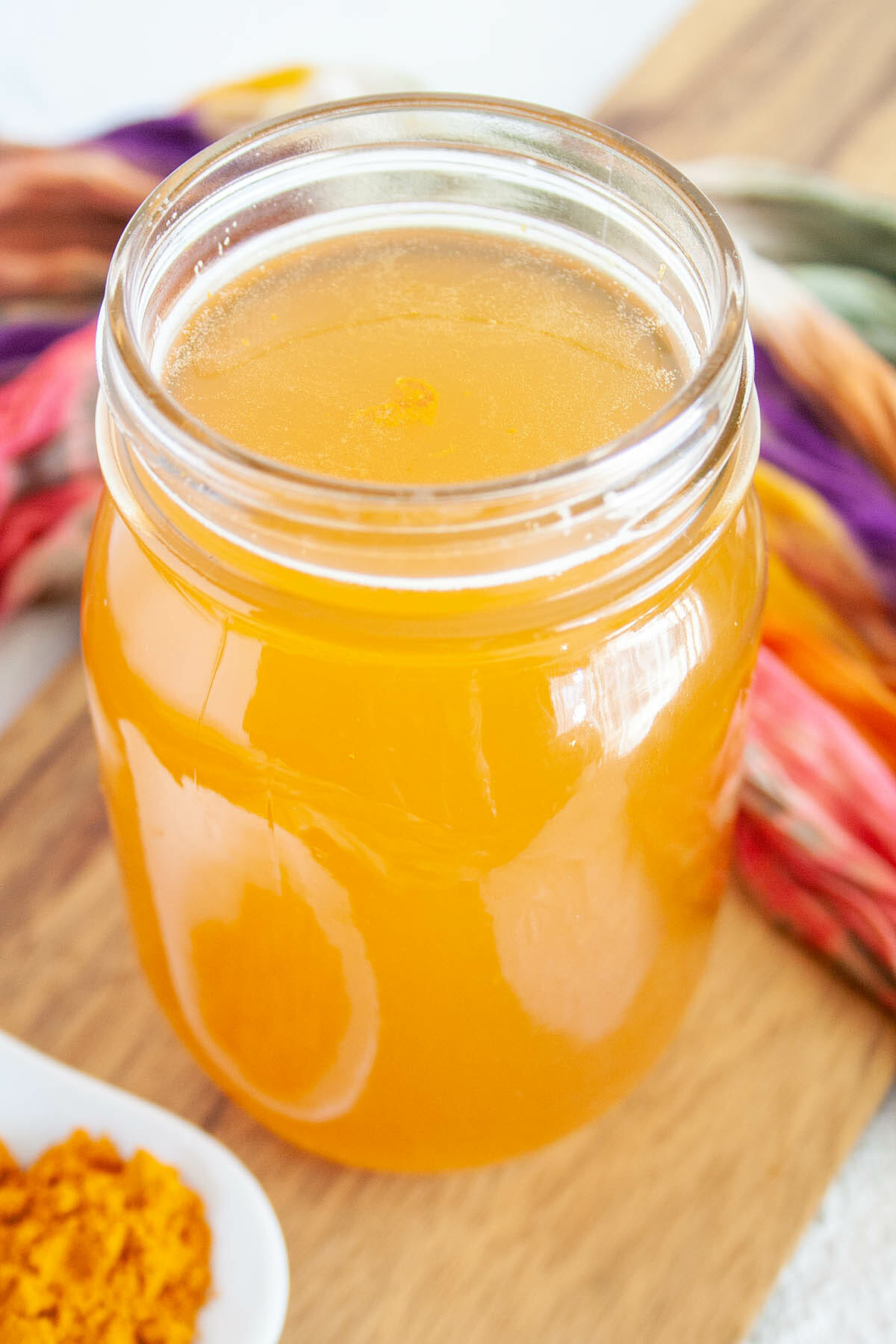 Lemon Turmeric Kombucha in mason jar.