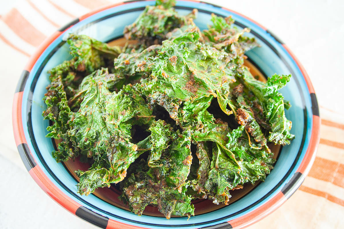Nacho Kale Chips in a bowl close up.