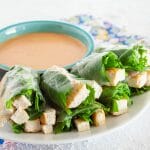 Tofu Spring Rolls with Peanut Dipping Sauce on a plate.