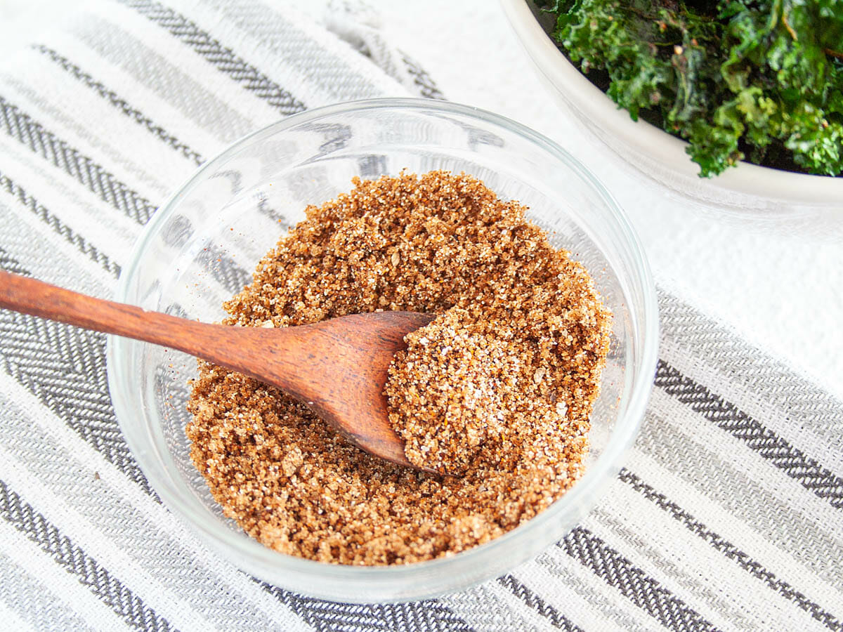 BBQ Seasoning in ramekin with wooden spoon.