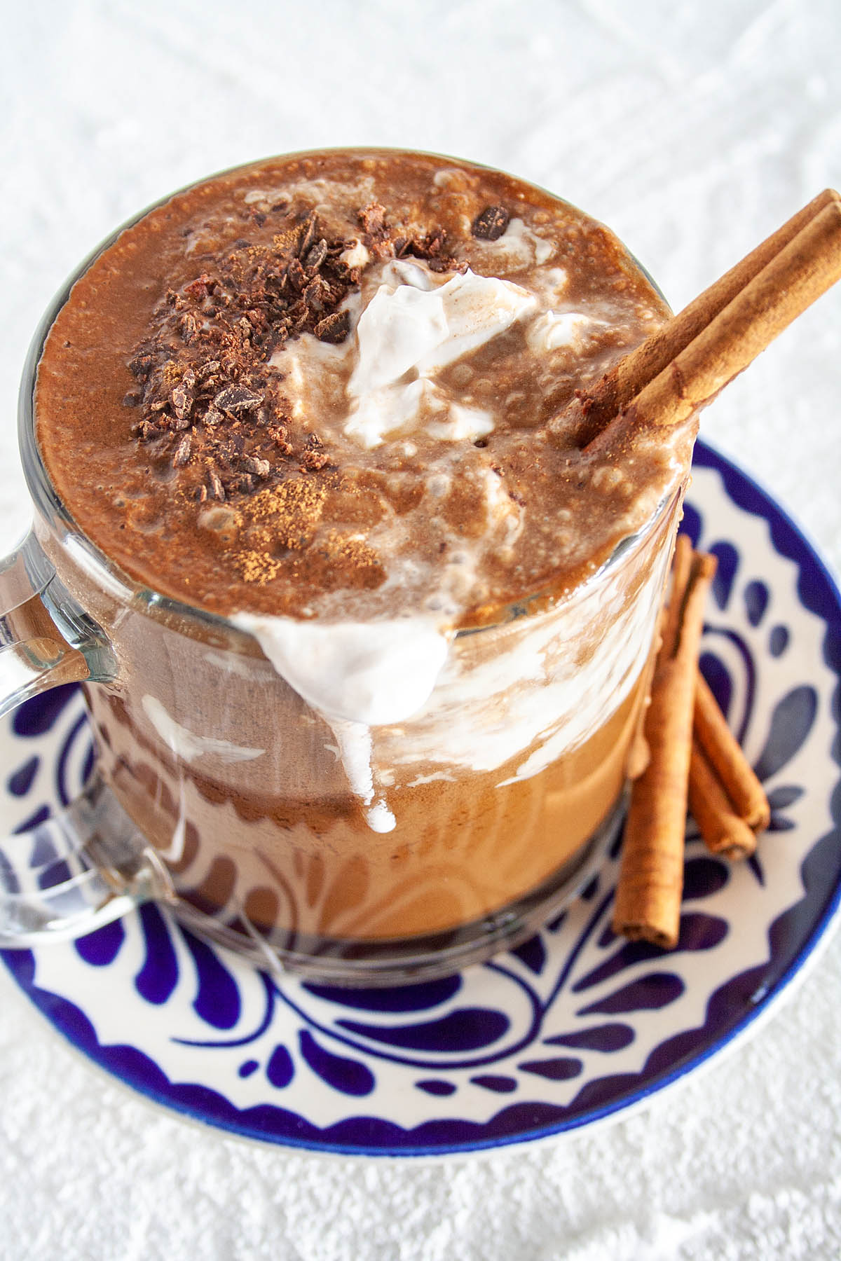 Gingerbread Hot Chocolate with cinnamon sticks.