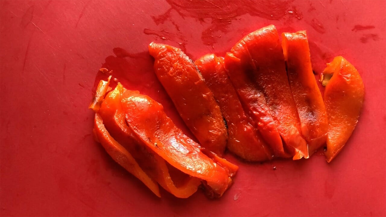 Roasted red pepper peeled and sliced.