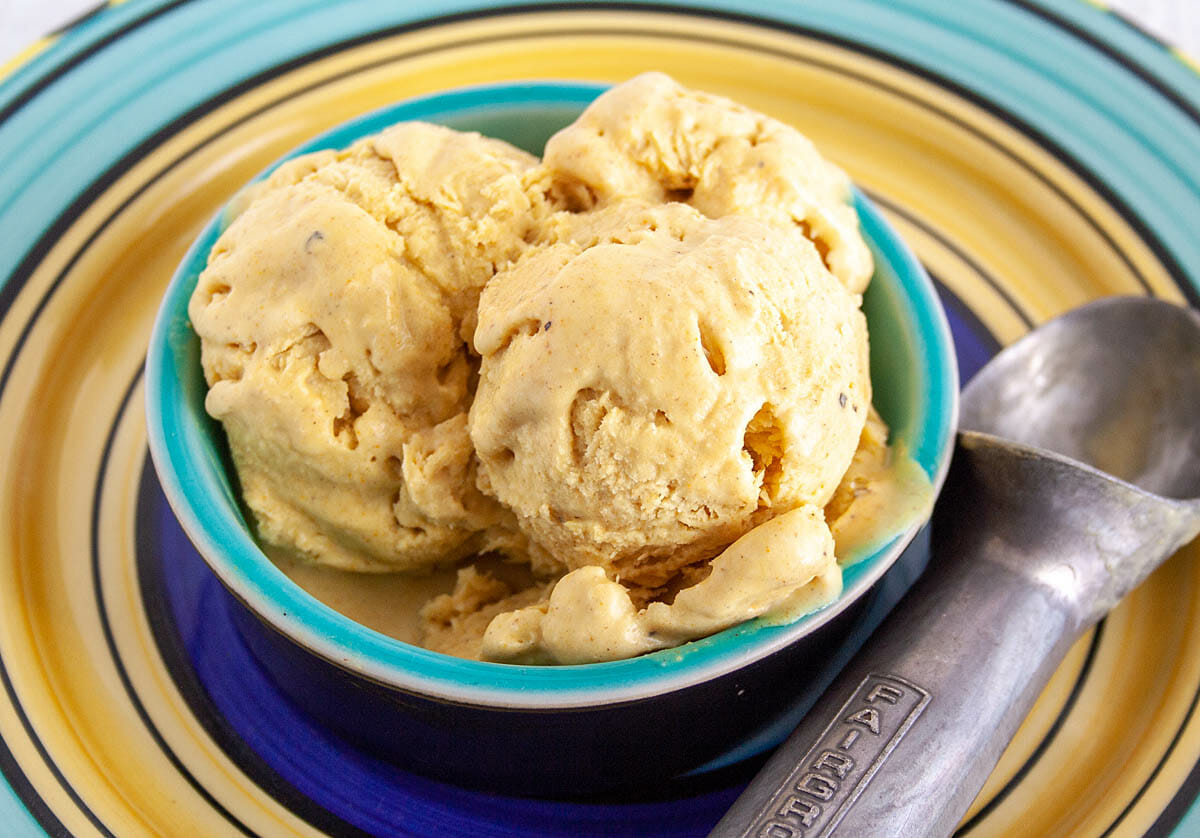 Turmeric Ice Cream with ice cream scoop.