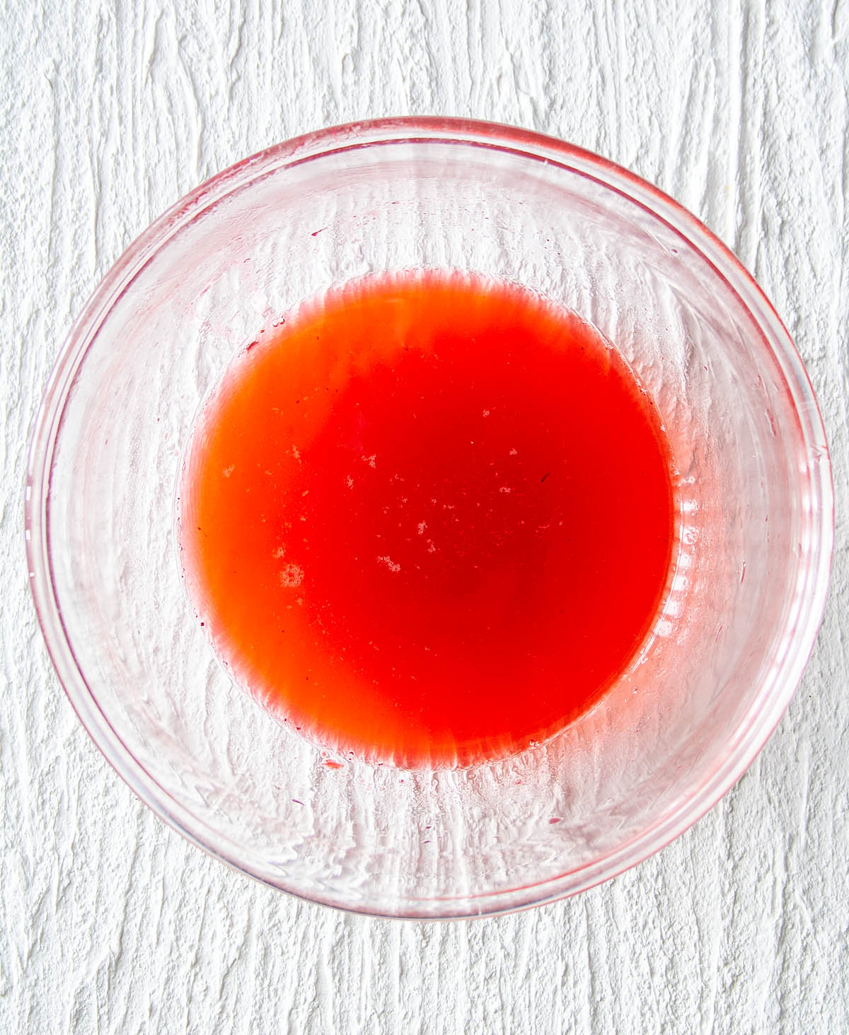 Raspberry Shrub after straining and adding vinegar.