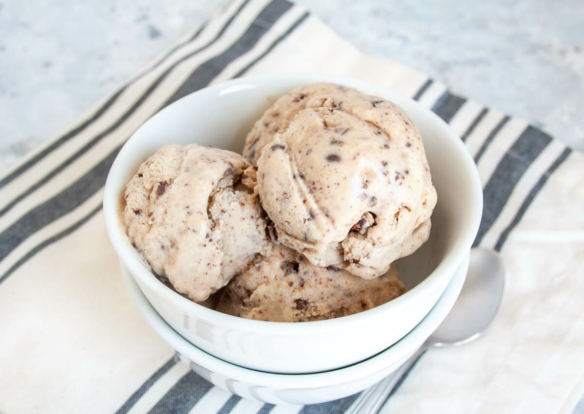 Vegan Chocolate Chip Ice Cream in bowl with spoon.