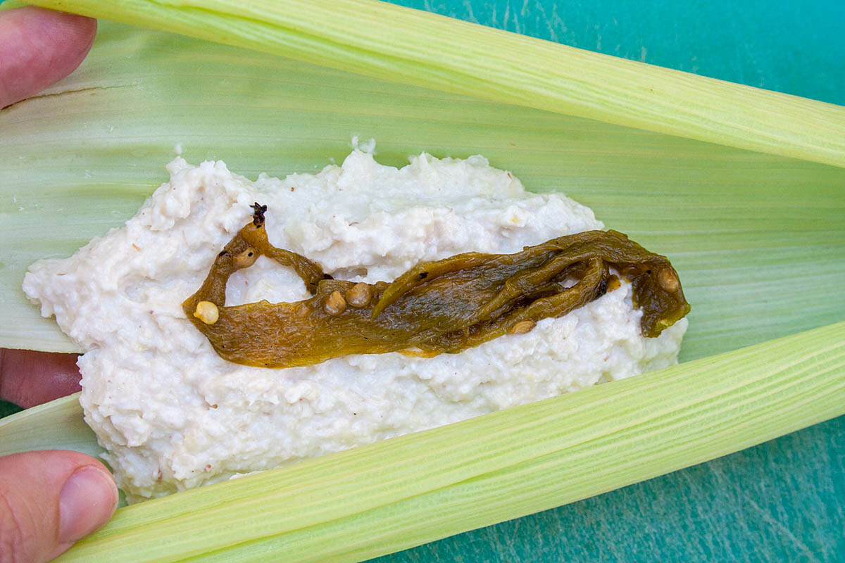 Husk filled with masa and green chiles.