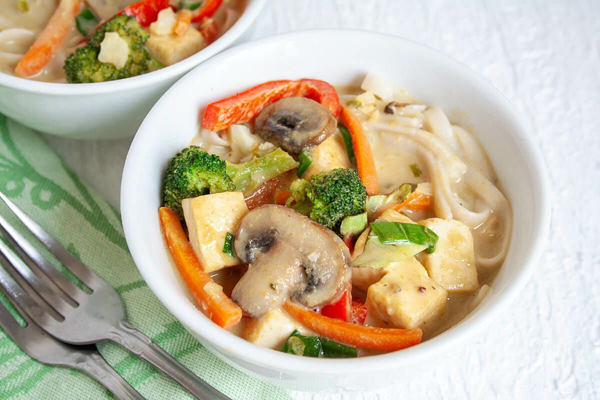 Green Curry with Tofu and Vegetables close up.