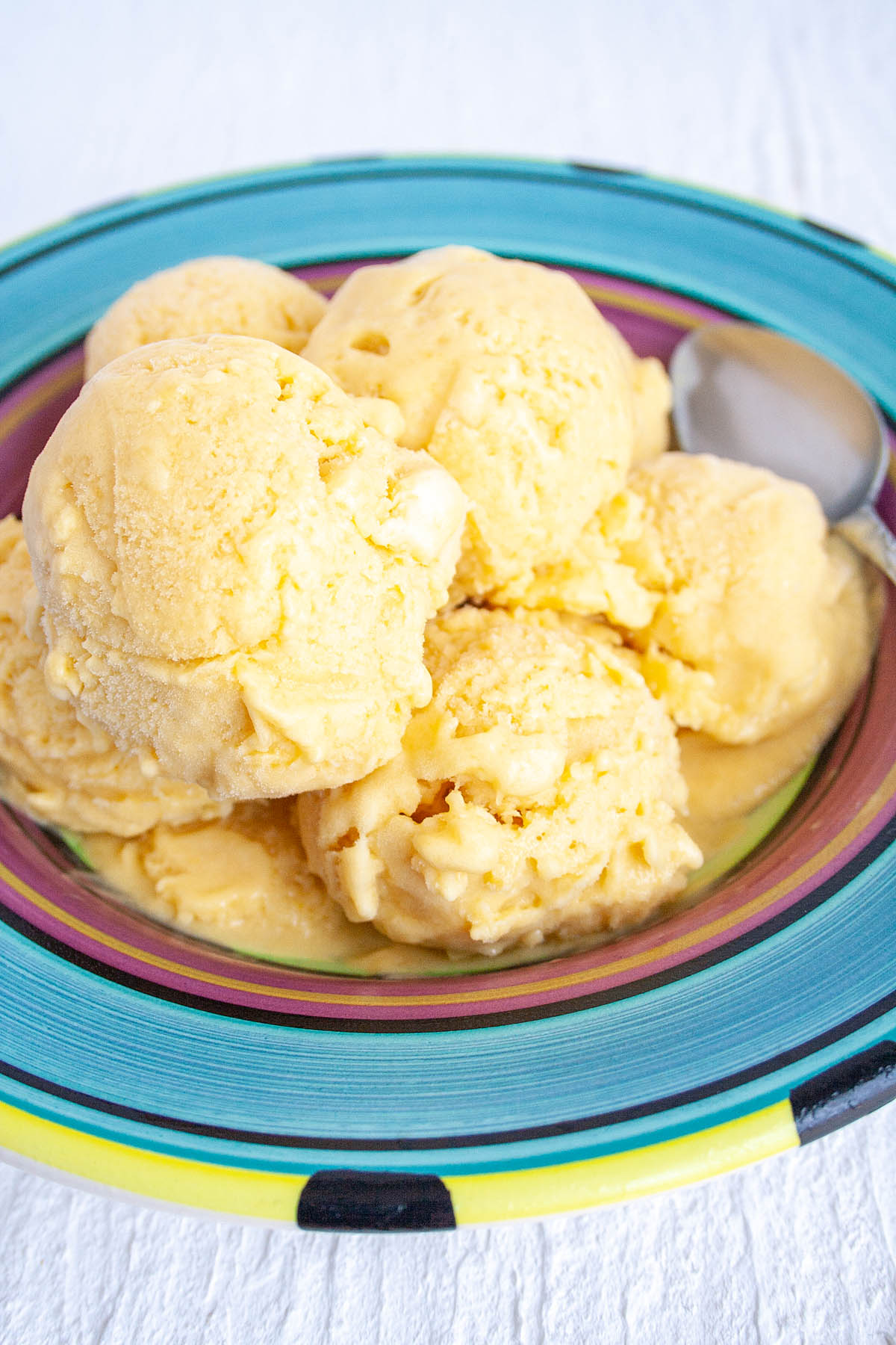 Mango Ice Cream in bowl close up.
