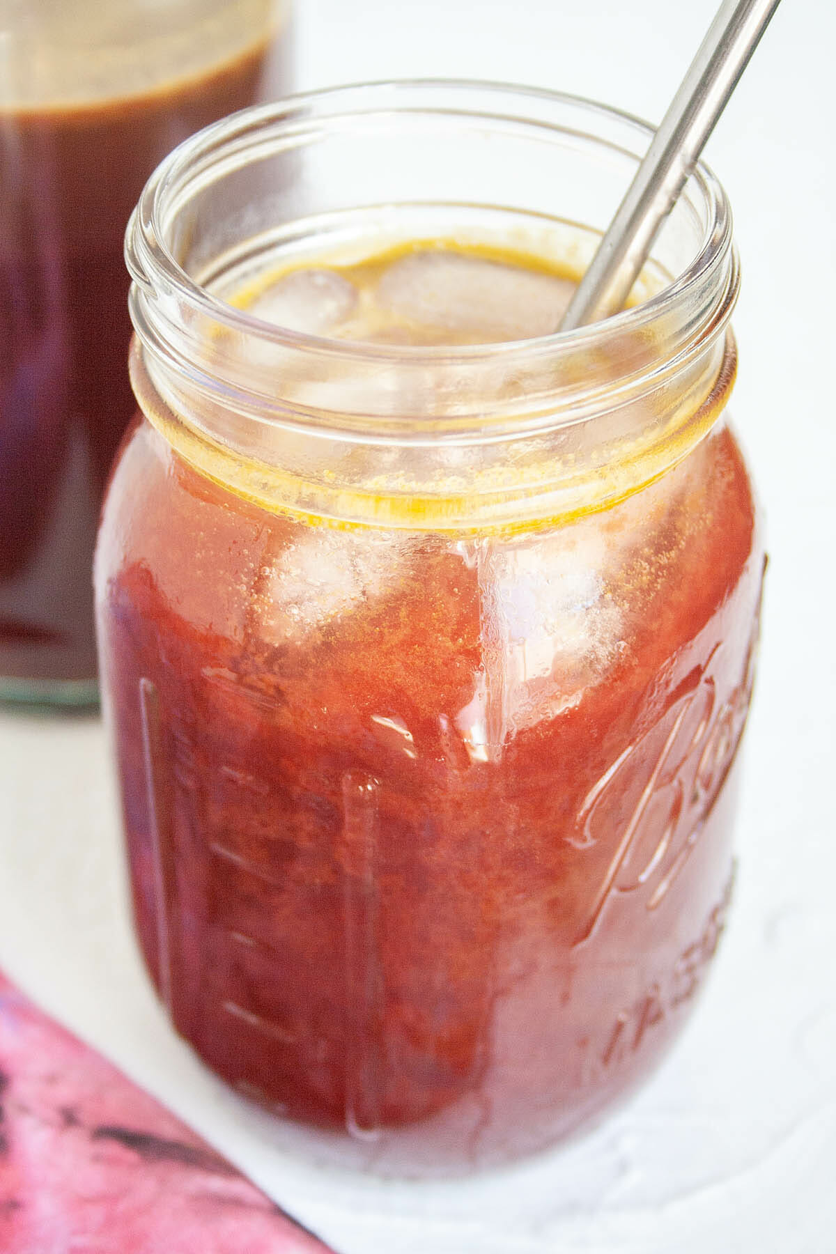 Acai Kombucha in mason jar close up.