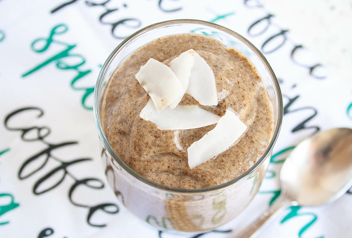 Thai Coffee Chia Pudding with coconut chips on top.