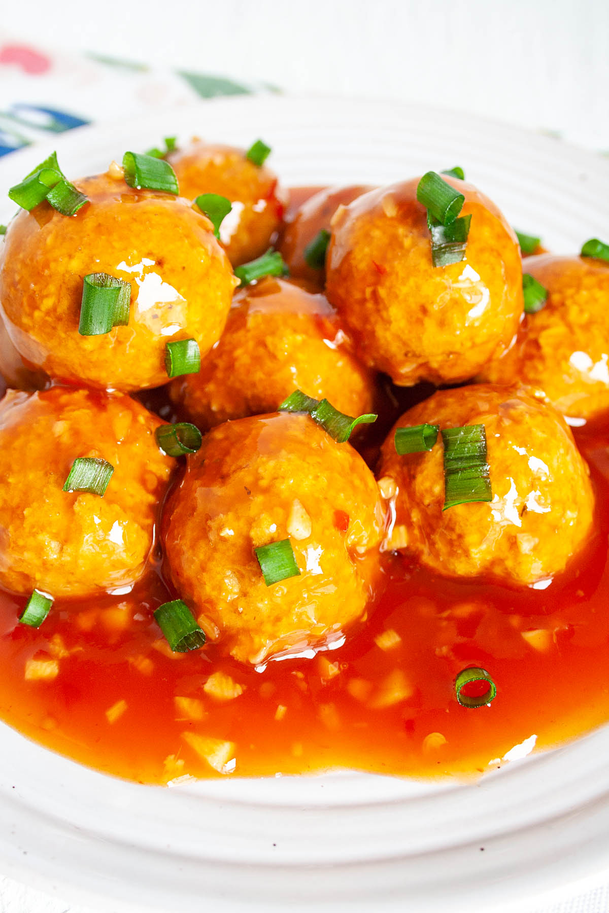 Asian Tofu Meatballs on a plate close up.