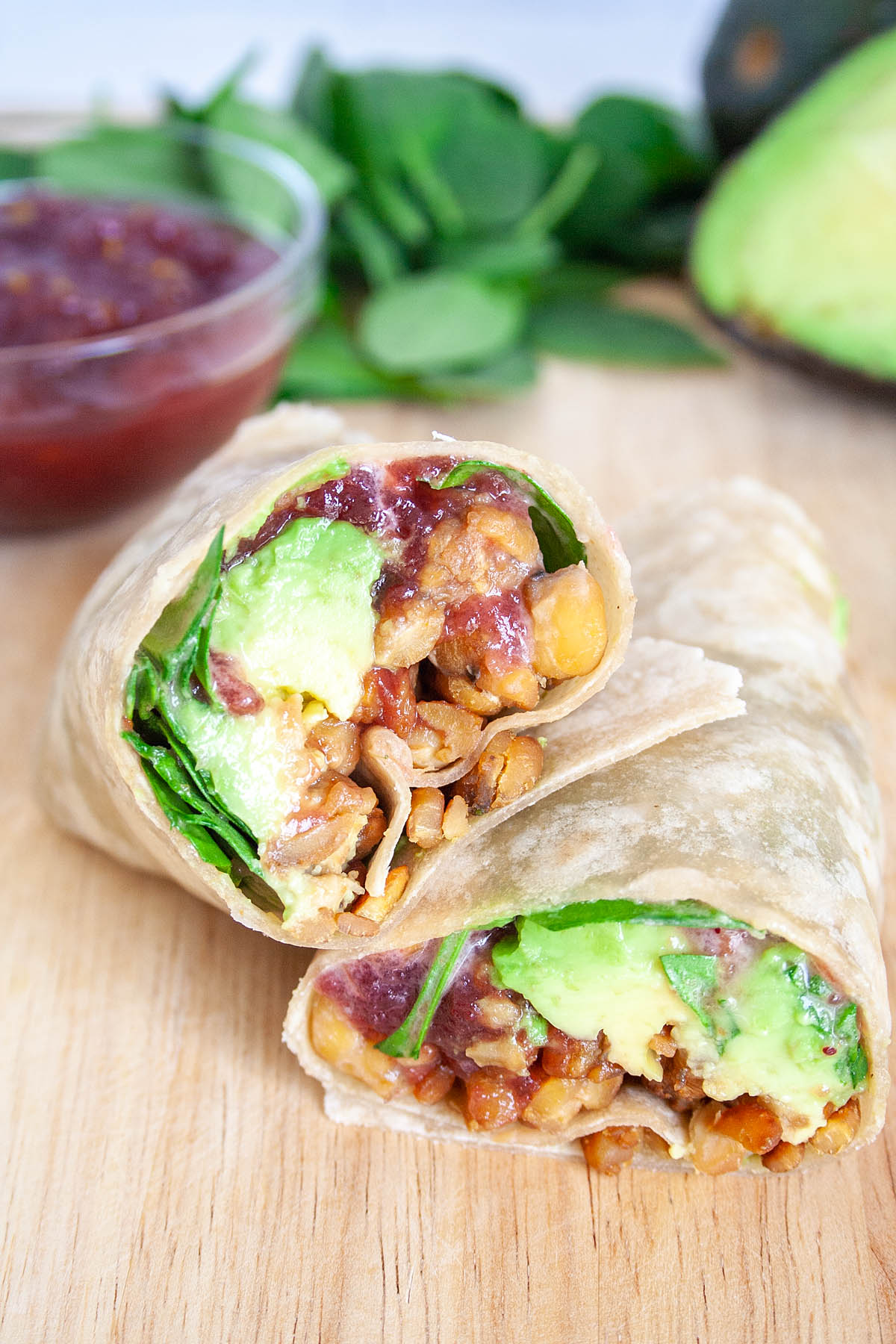 Tempeh Avocado Wrap on cutting board.