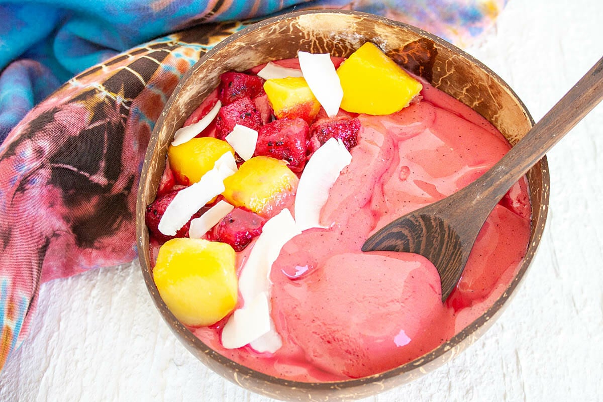 Dragon Fruit Smoothie Bowl in bowl with spoon.