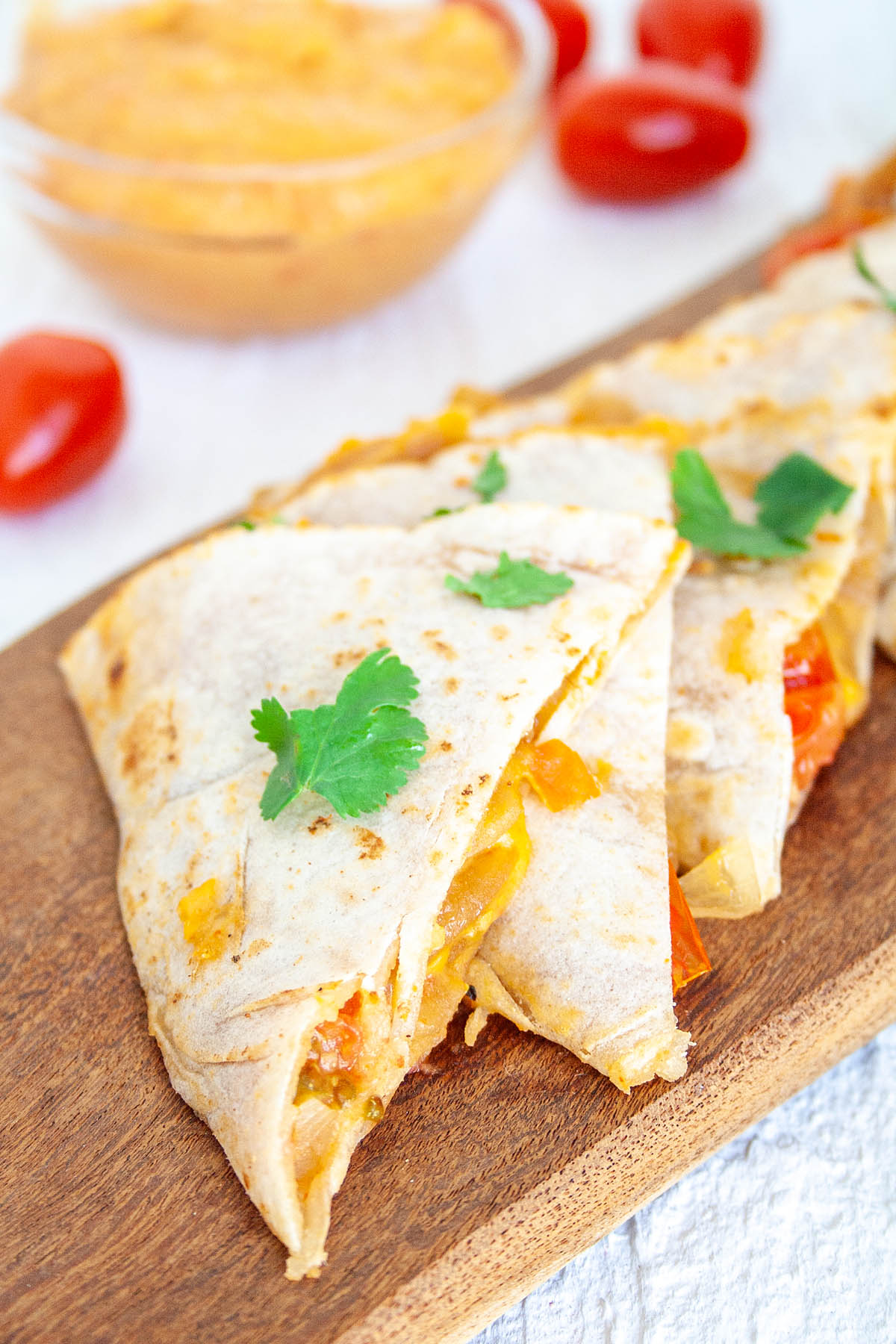 Hummus Quesadilla on cutting board.