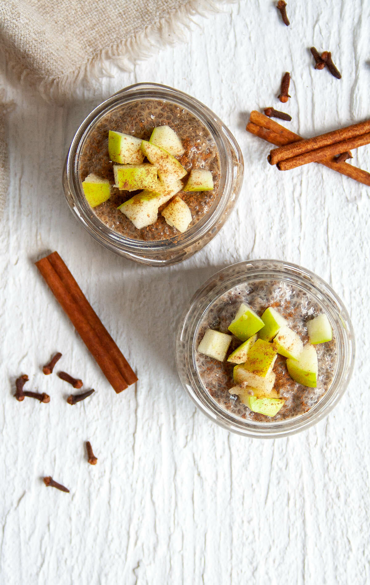 Chai Chia Pudding with chopped apple on top.