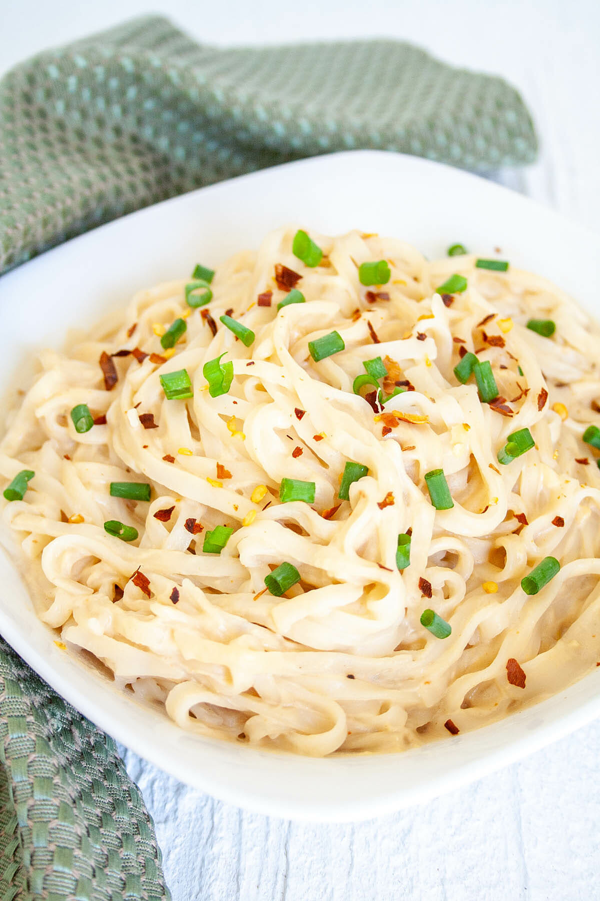 Tahini Noodles in bowl cose up.