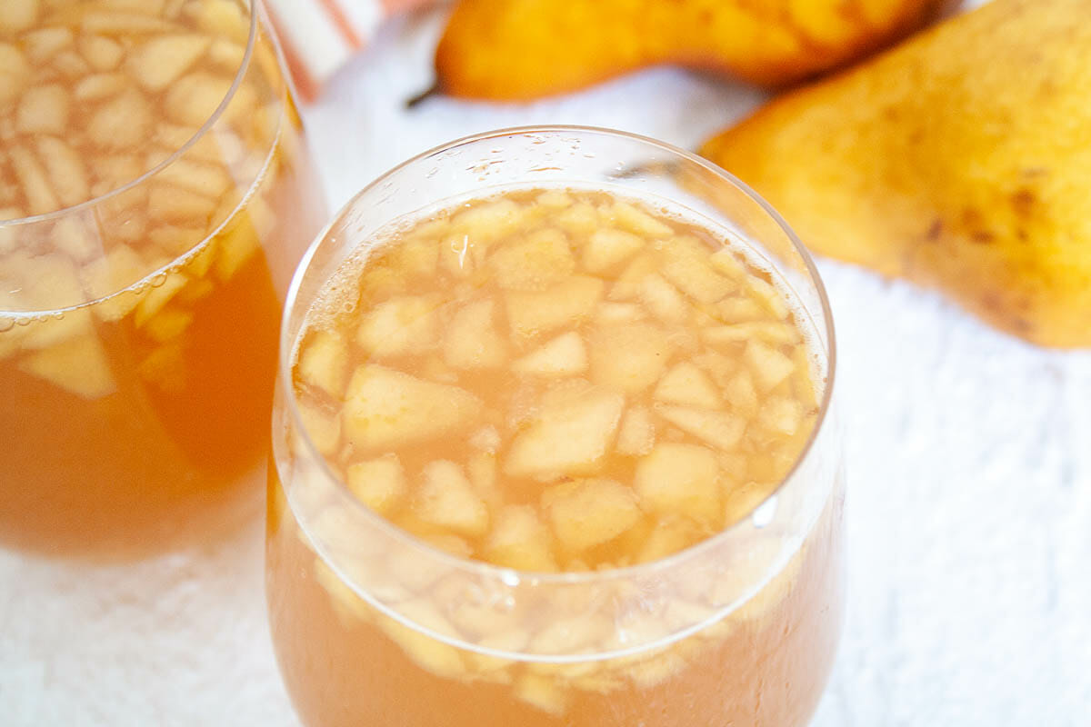 Pear Kombucha in two glasses with pears.