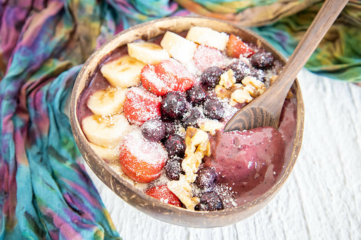 Acai Berry Bowl in a bowl with spoon.