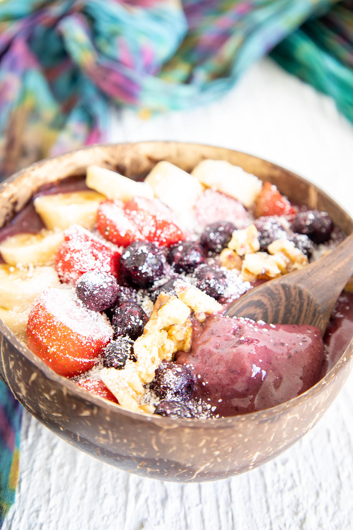 Acai Berry Bowl in a bowl with spoon.
