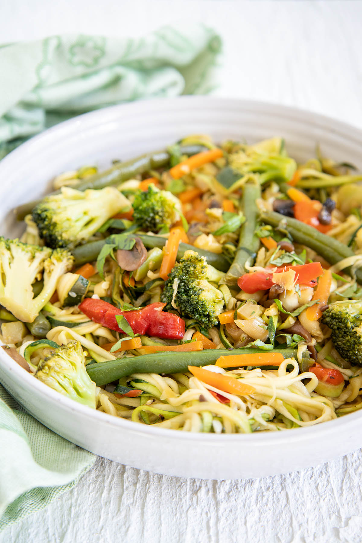 Frozen Vegetable Stir Fry With Zucchini Noodles in a bowl.
