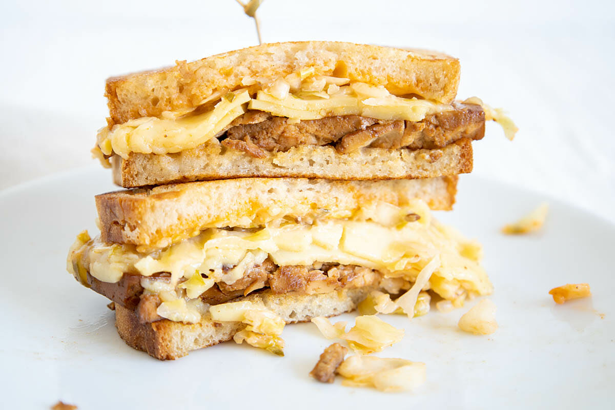 Vegan Reuben Sandwich on a cutting board.