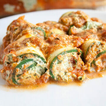 Zucchini Lasagna Roll-Ups on a plate.