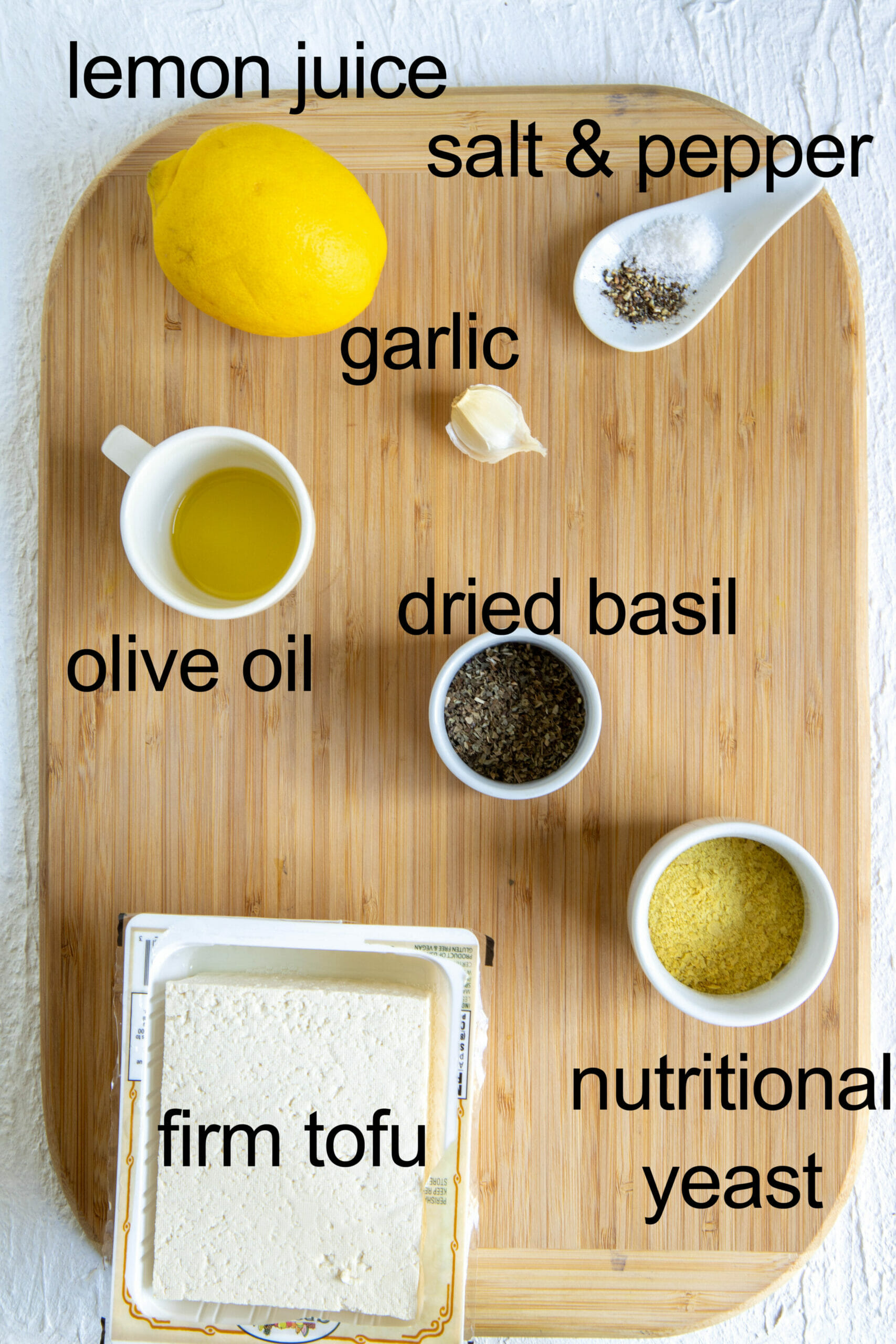 Ingredients on a cutting board with labels.