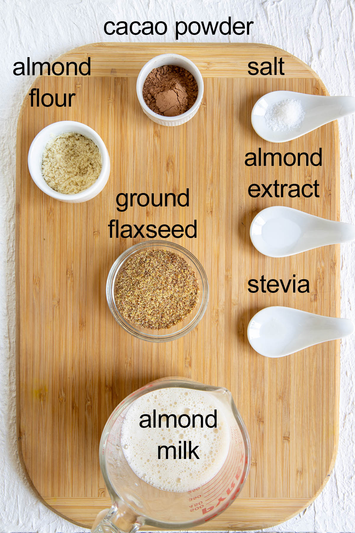 Ingredients on a cutting board with labels.