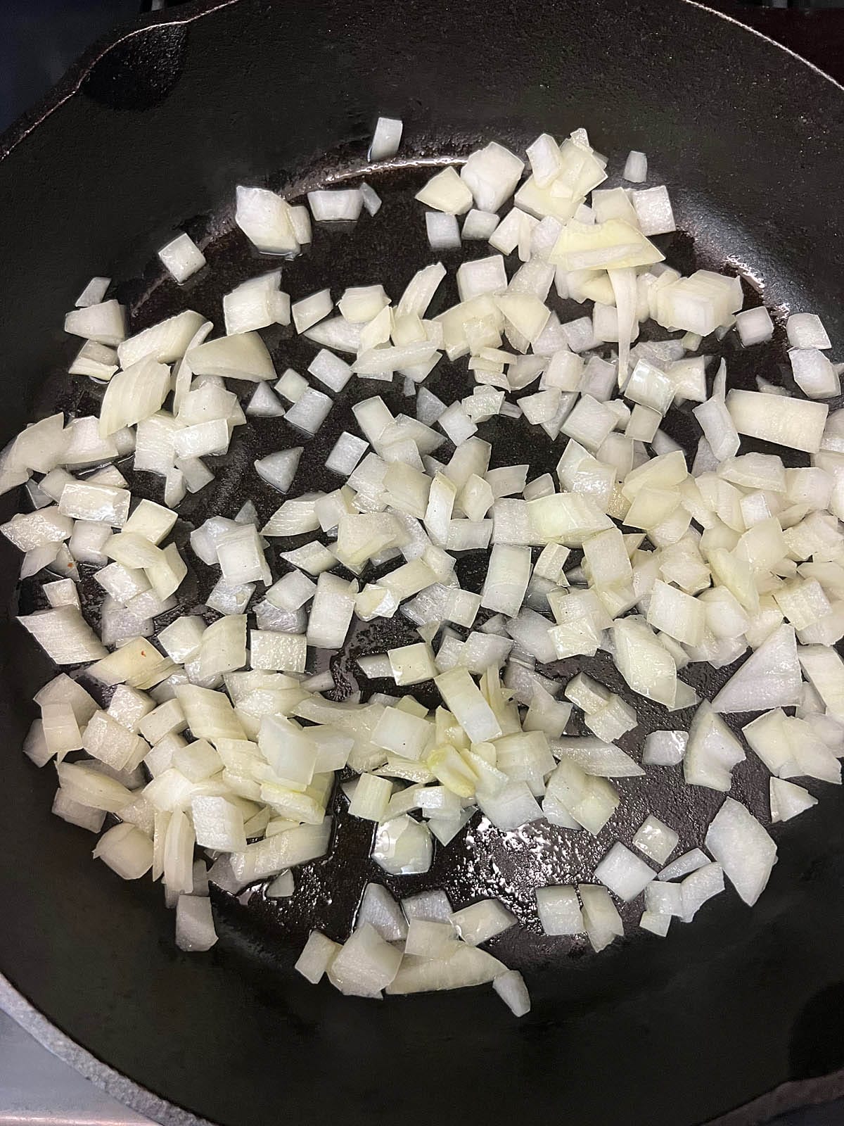 Sauteed onions in a cast iron skillet.