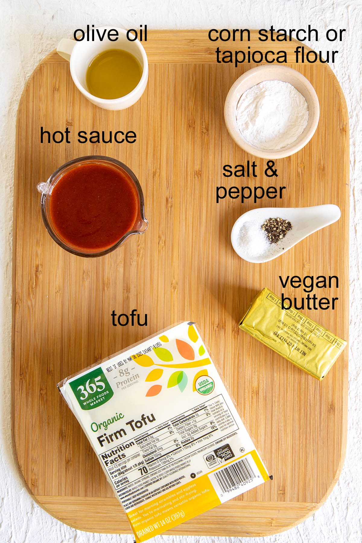Buffalo tofu ingredients on a cutting board with labels.
