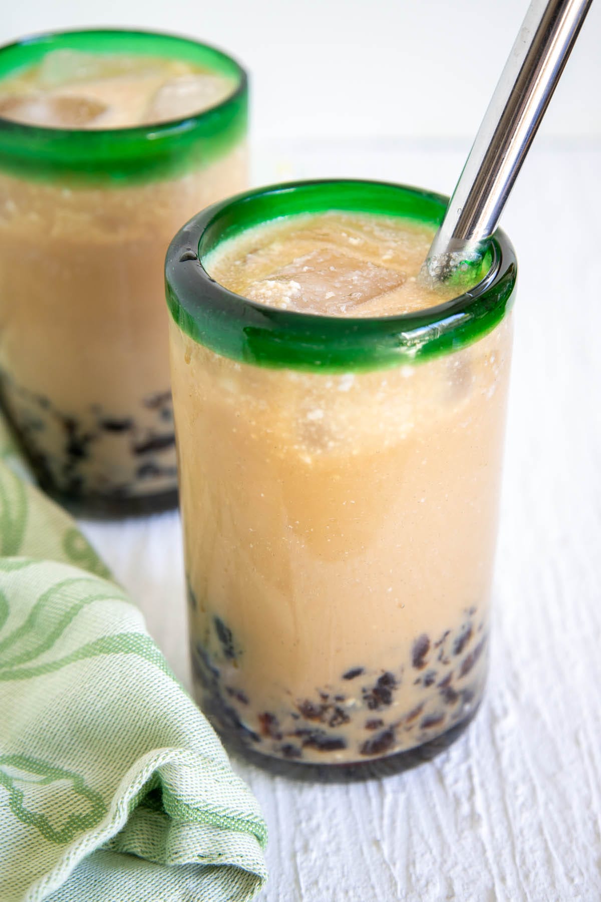 Coconut Bubble Tea in two glasses with straw.