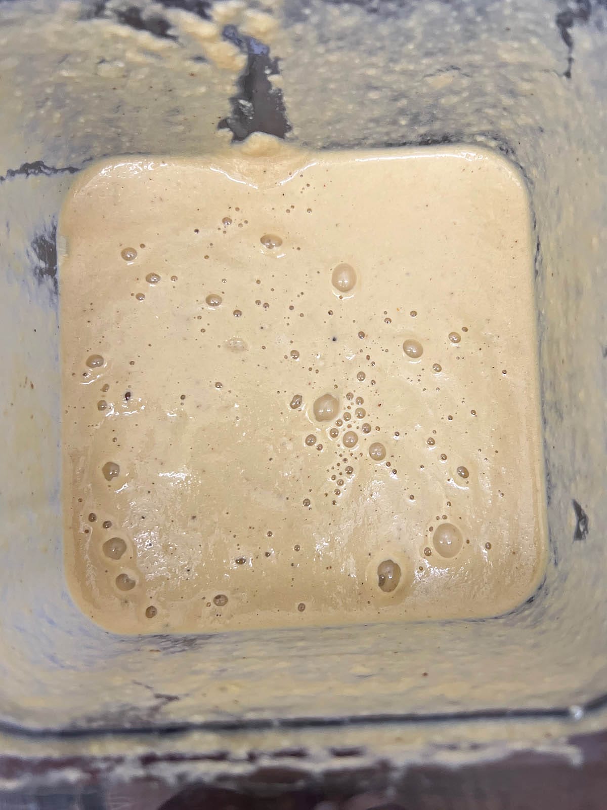 Blended cauliflower soup in a blender.