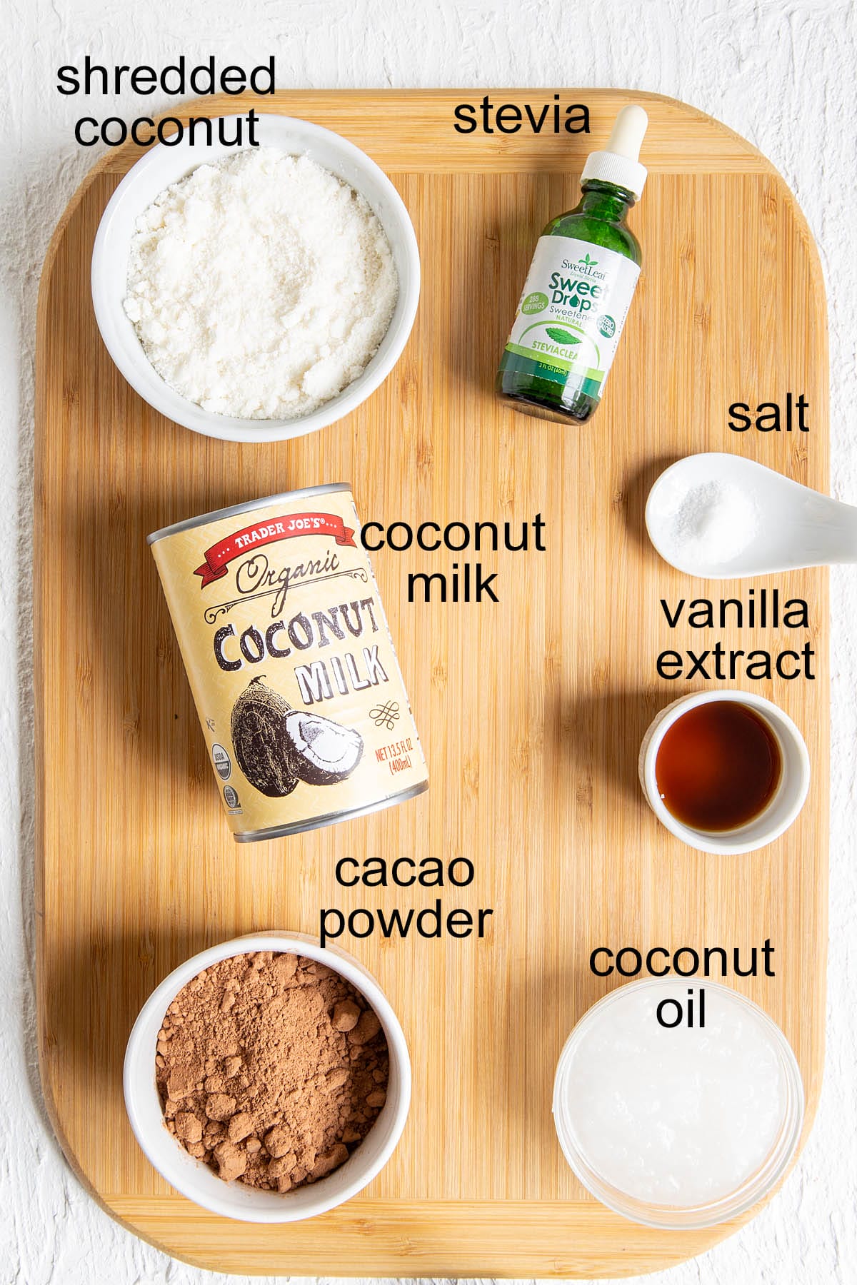 Mounds bars ingredients on a cutting board with labels.