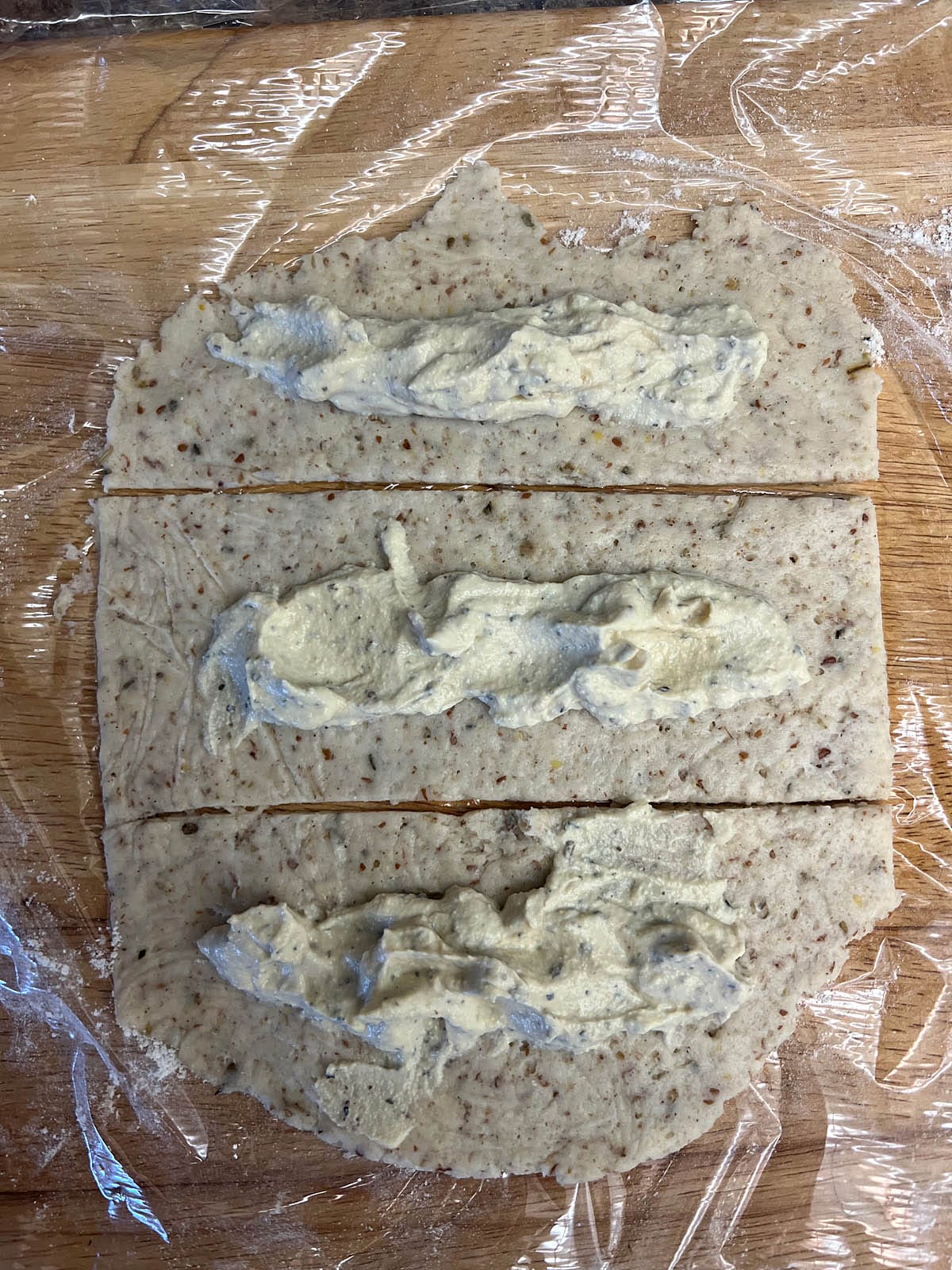 Tofu ricotta spread on pizza dough.