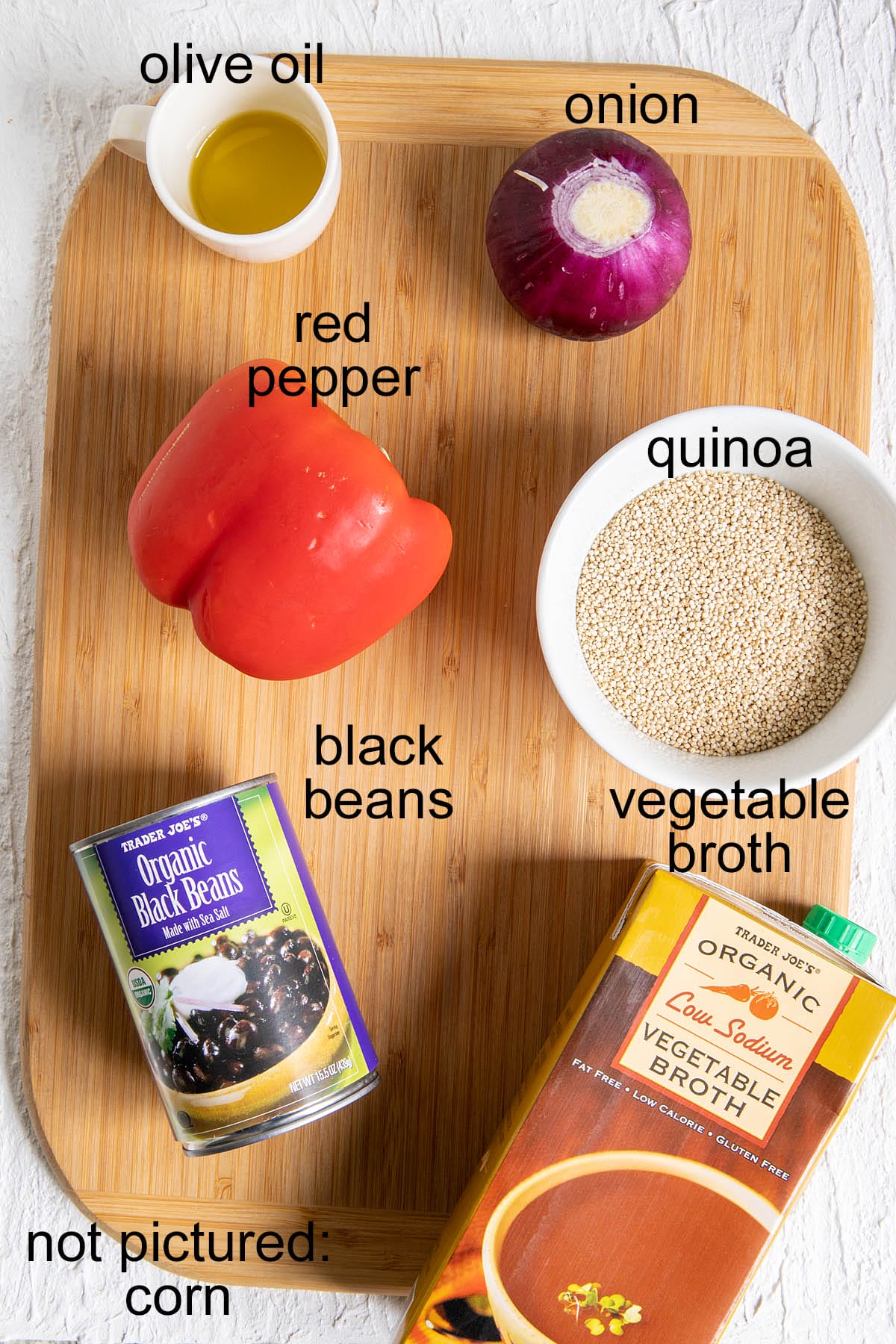Ingredients on a cutting board with labels.