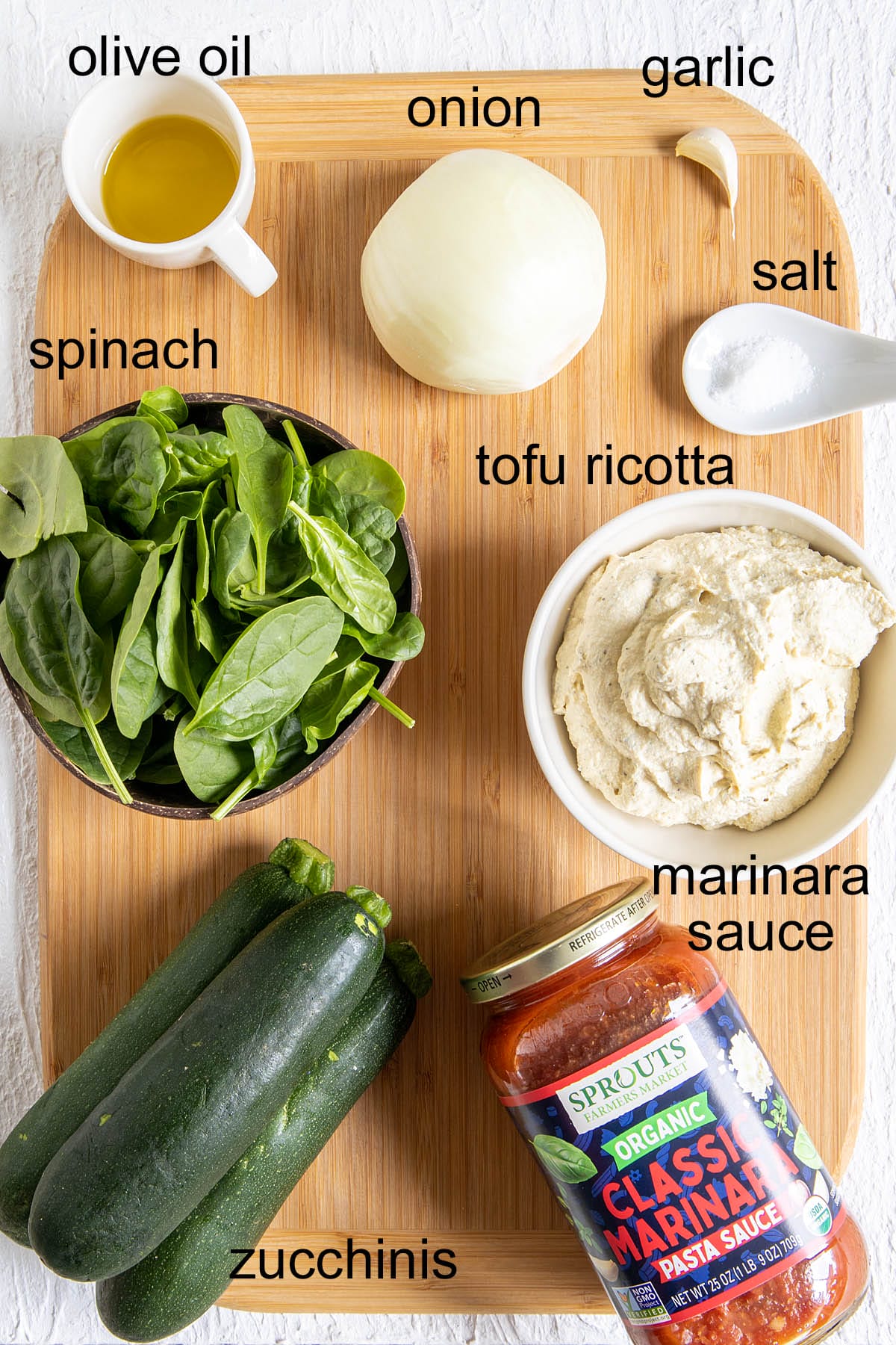 Ingredients on a cutting board with labels.