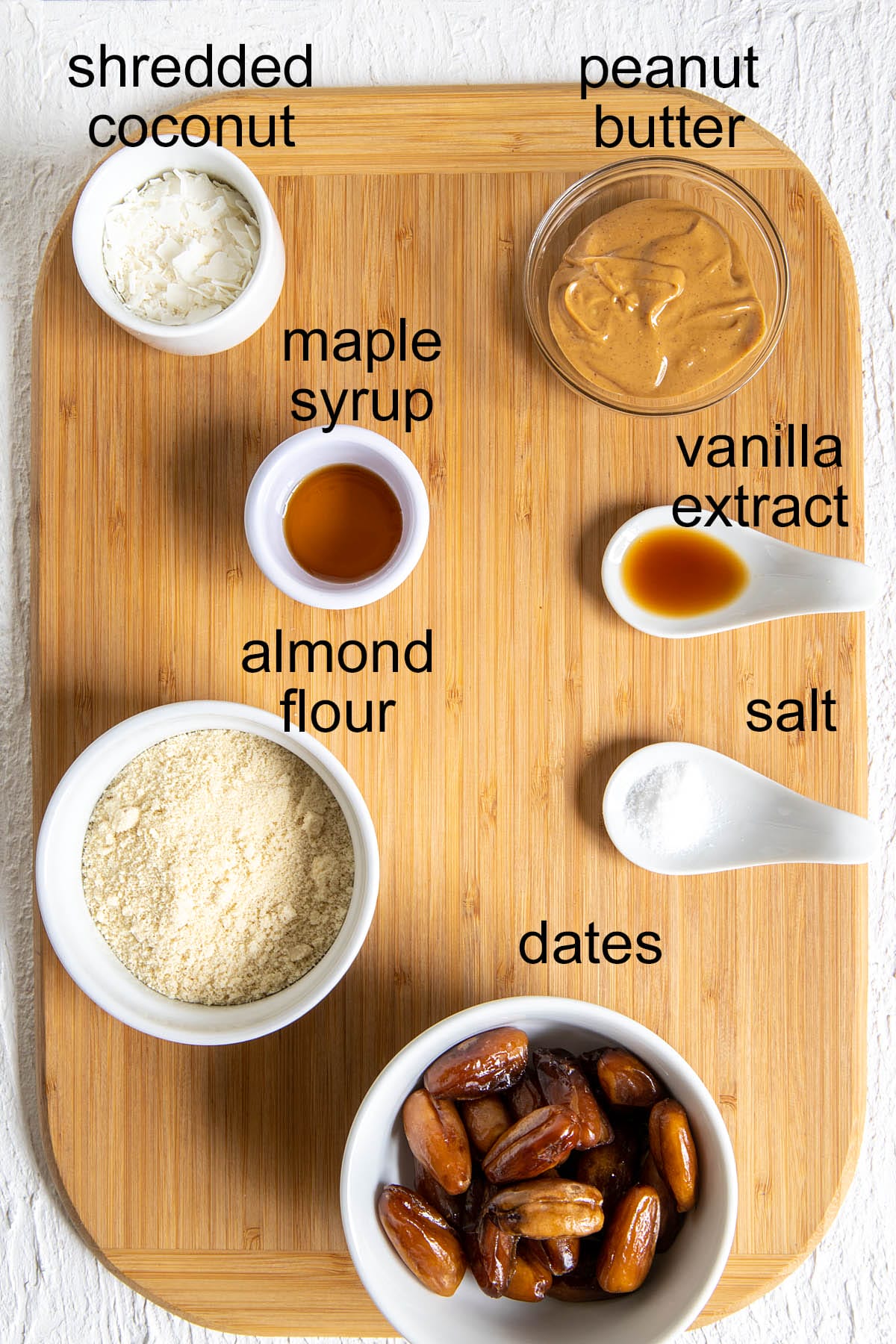 Ingredients on a cutting board with labels.