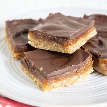 No-Bake Chocolate Peanut Butter Caramel Bars on a plate.