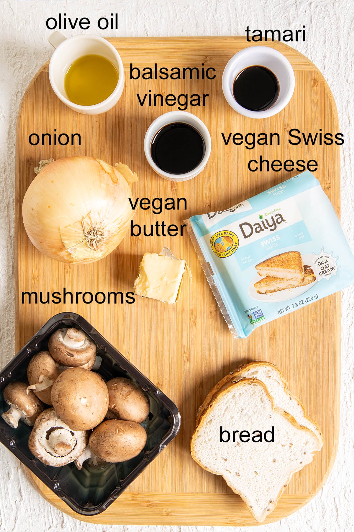 Ingredients on a cutting board with labels.