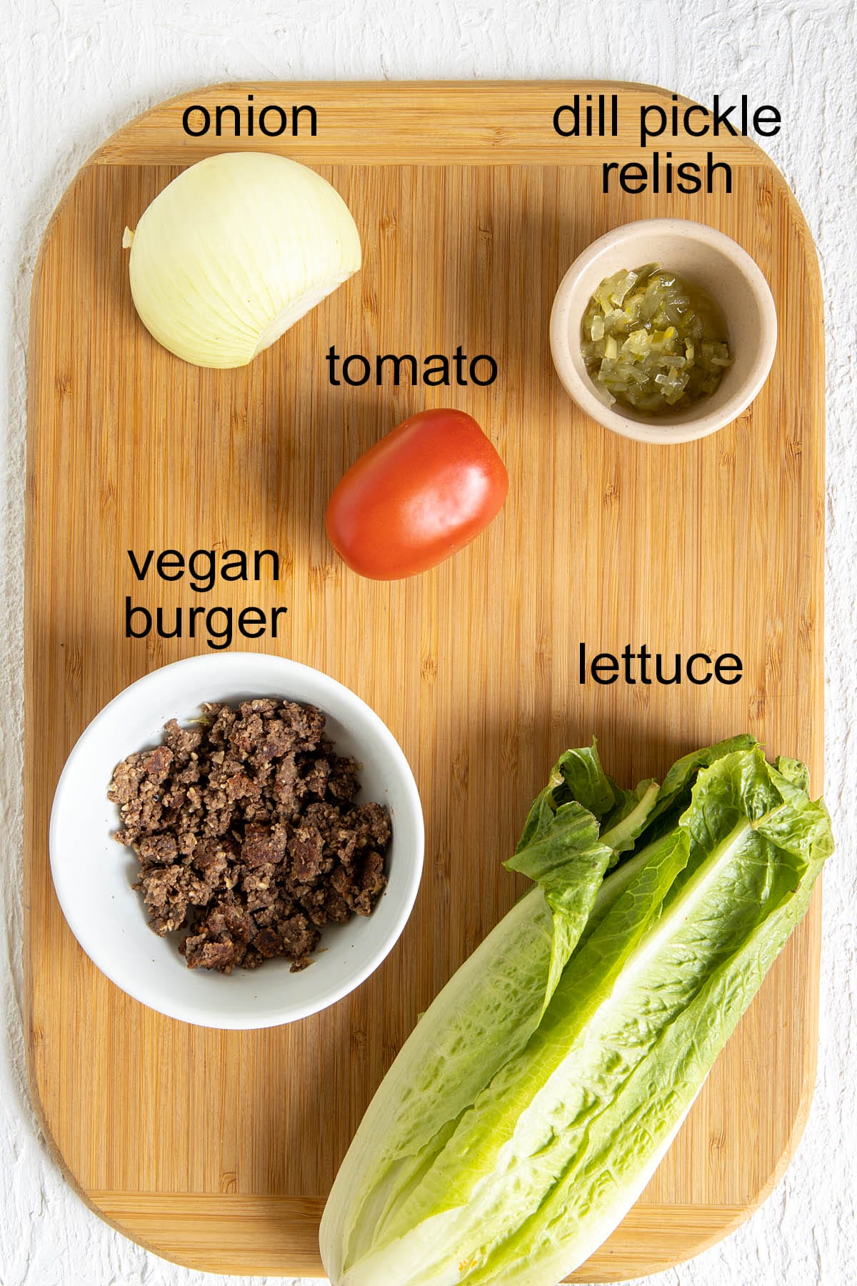 Ingredients on a cutting board with labels.