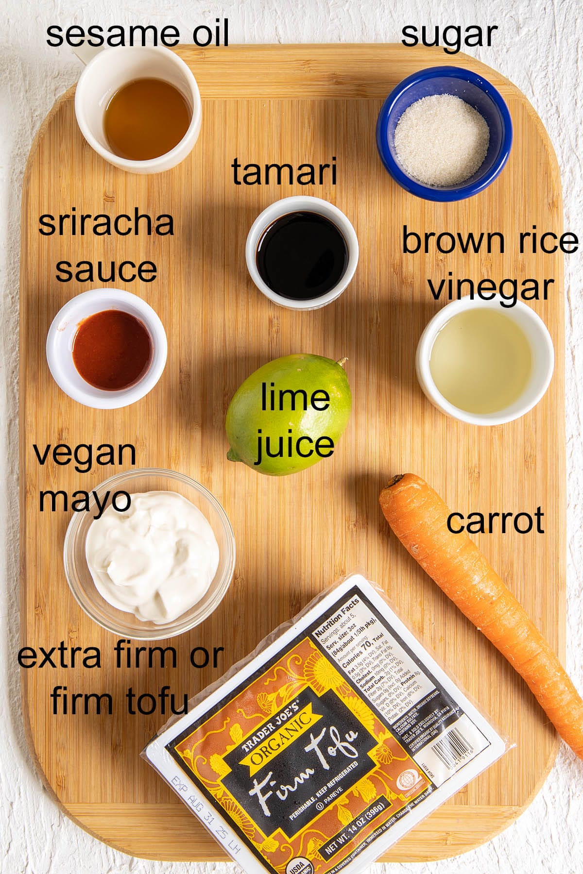 Ingredients on a cutting board with labels.