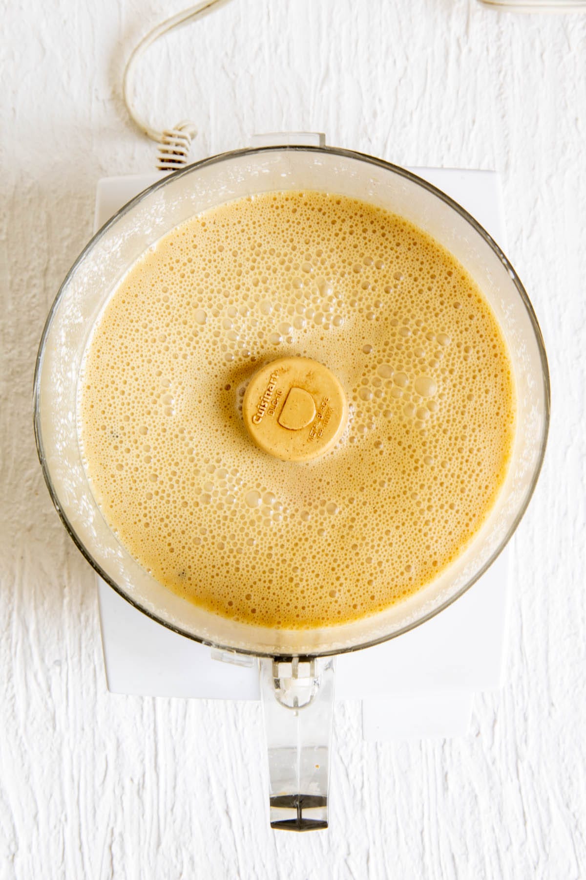 Ingredients in a food processor after blending.