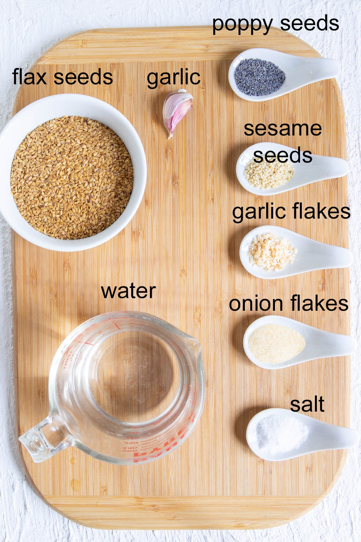 Ingredients on a cutting board with labels.