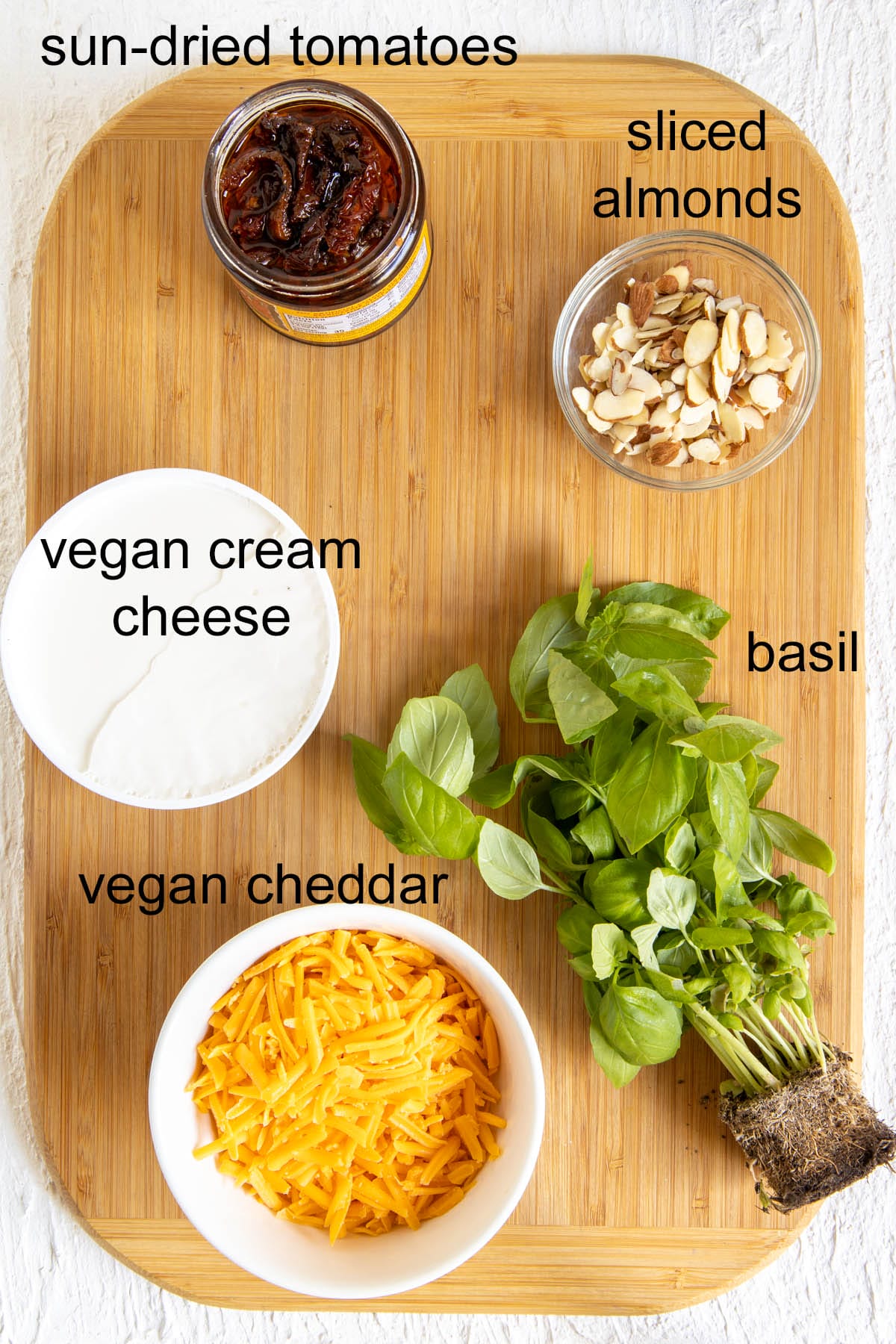 Ingredients on a cutting board with labels.