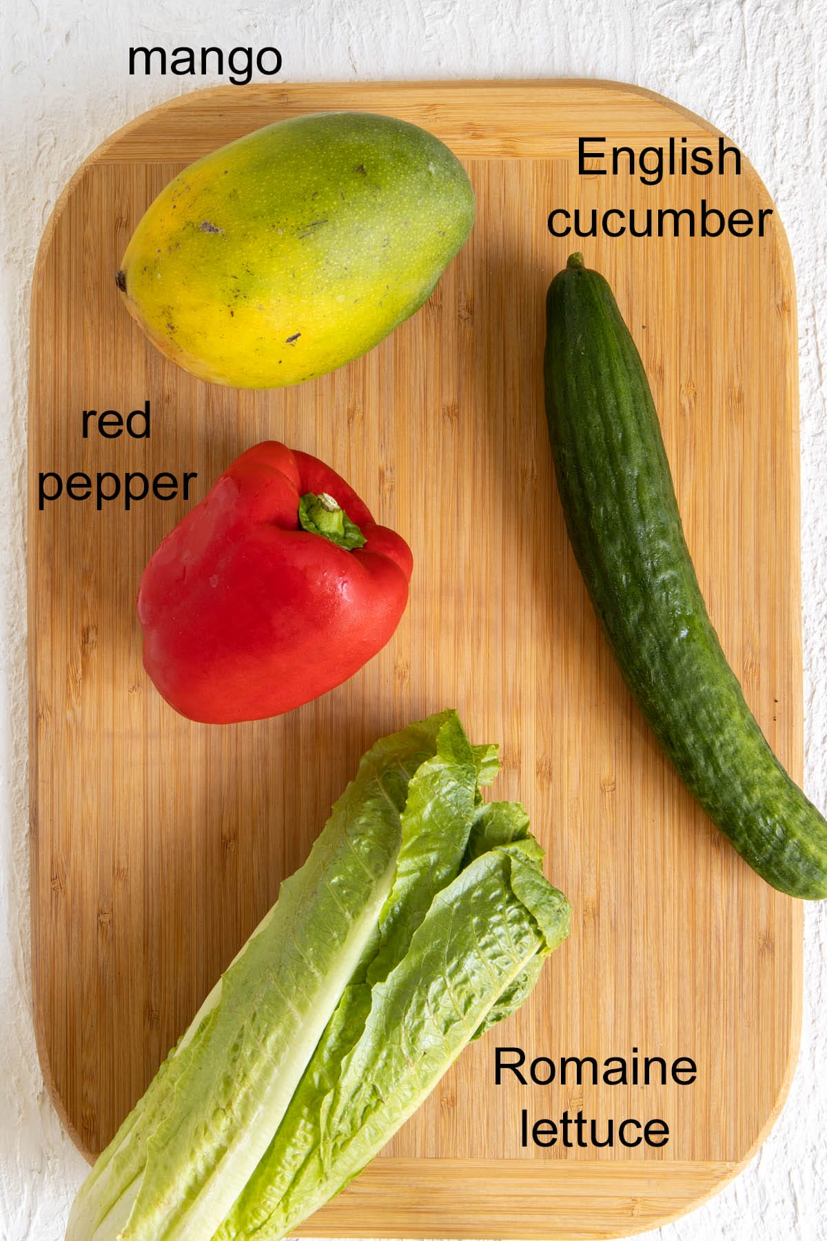 Ingredients on a cutting board with labels.